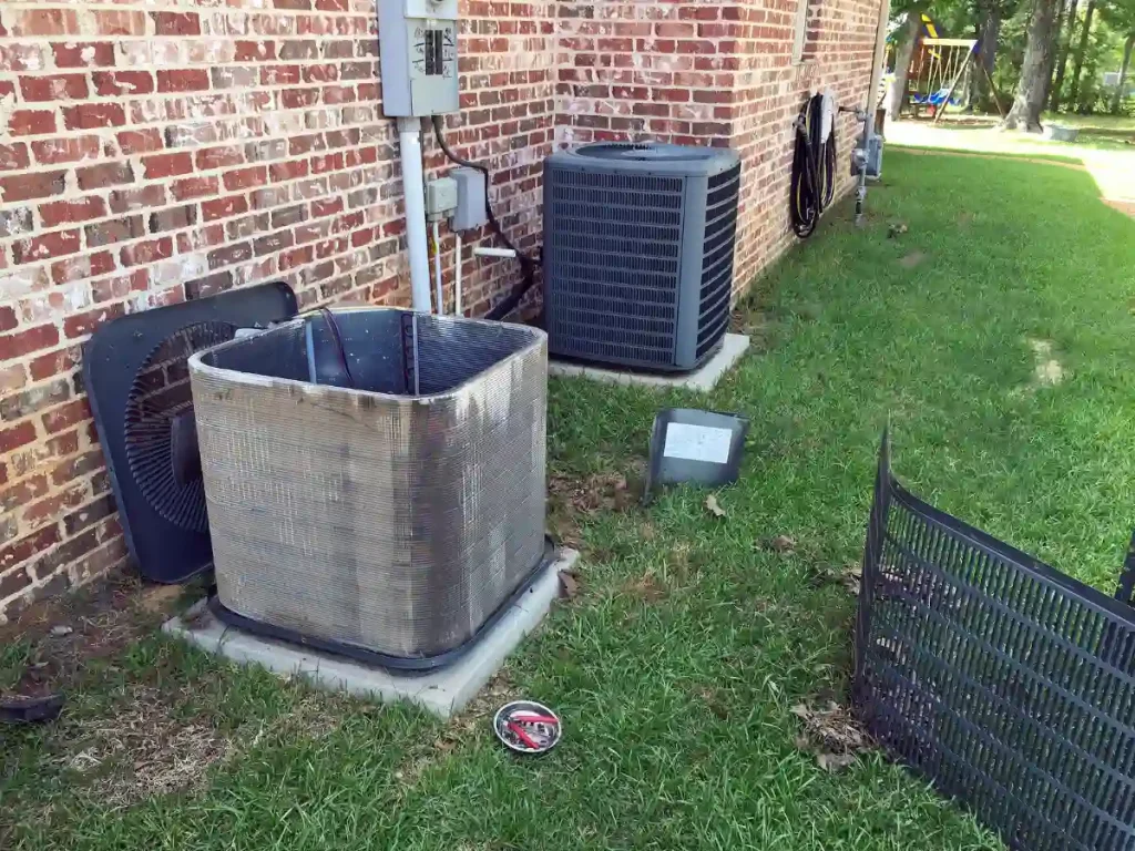 A well-maintained outdoor AC condenser with clear surroundings.